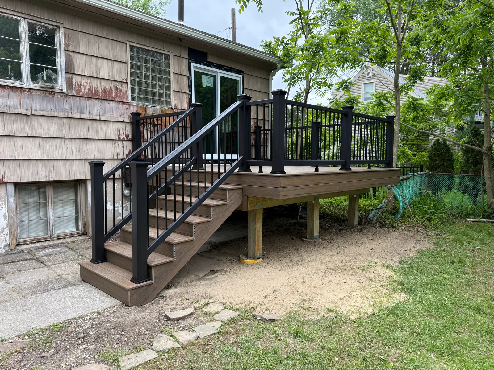 New baseboards and molding installed in living room