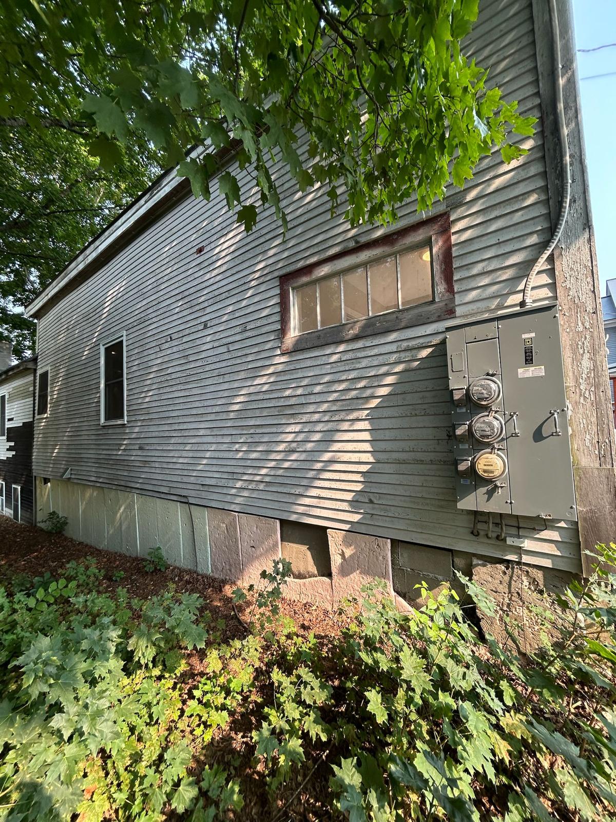 Fence staining project with uniform natural wood tone