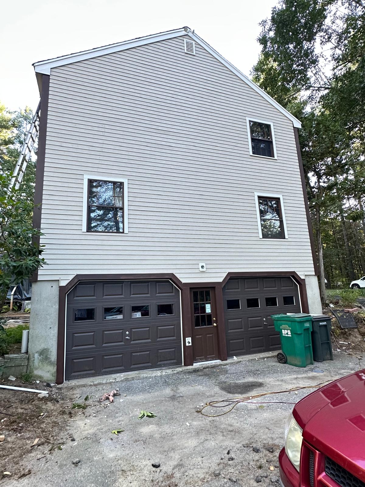 Fence staining project with uniform natural wood tone