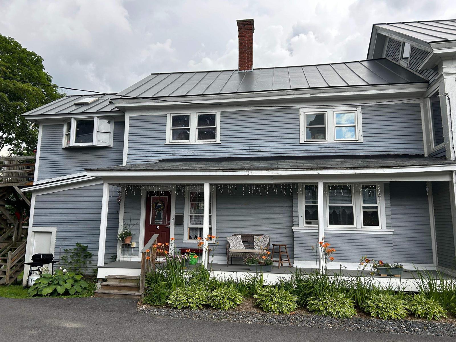 Fence staining project with uniform natural wood tone