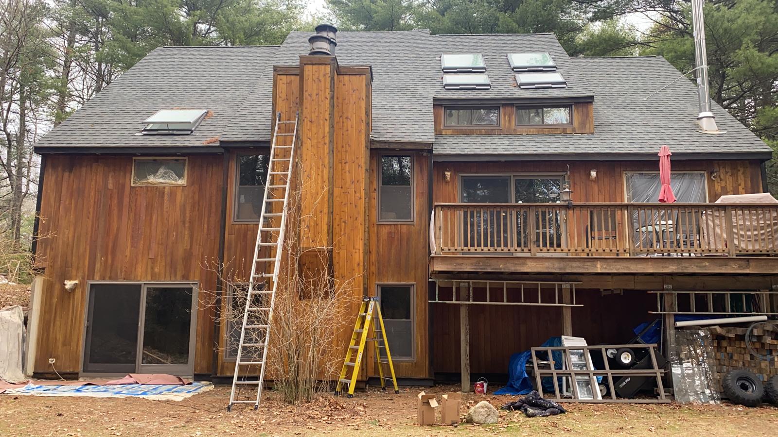 Outdoor porch and railing repainted in durable exterior enamel