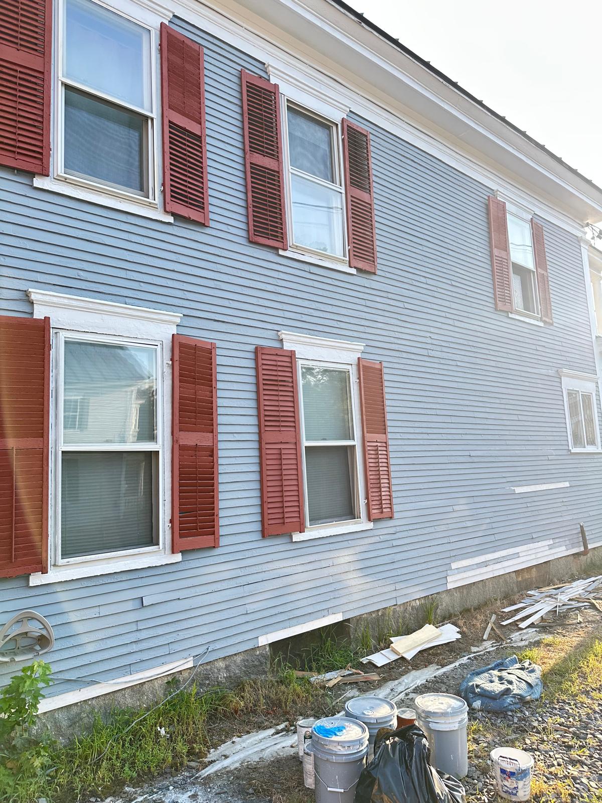 Fence staining project with uniform natural wood tone