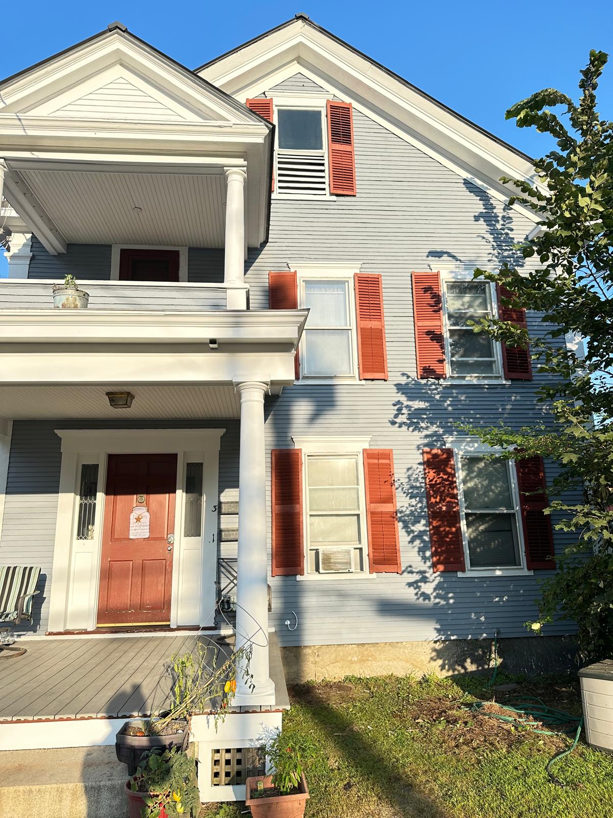 Fence staining project with uniform natural wood tone